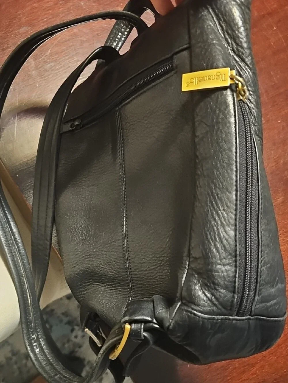 Tignanello Black Leather Backpack with Gold Hardware